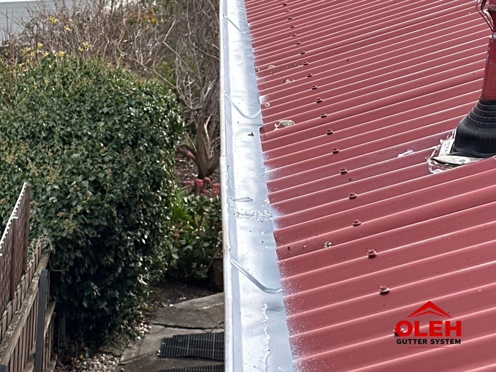 Restored gutter after protective coating in Hobart Tasmania