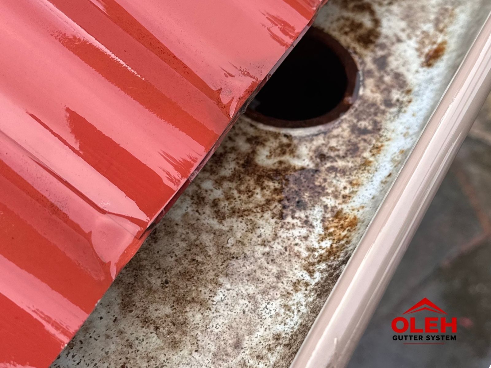 Internal gutter rust revealed after gutter cleaning in Hobart Tasmania