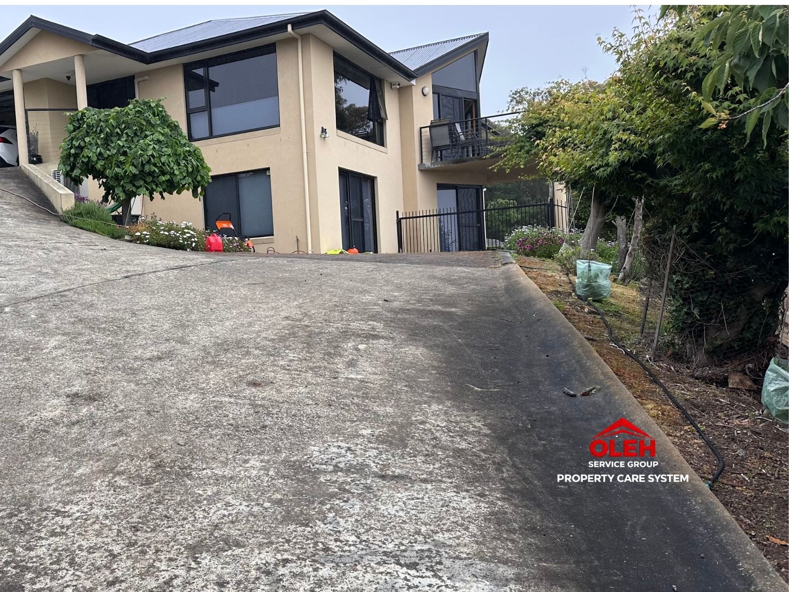 Residential driveway before pressure cleaning in Hobart